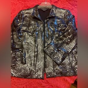 Lined evening jacket. Collar. Open front. 3/4 sleeves. Black. Wore once.